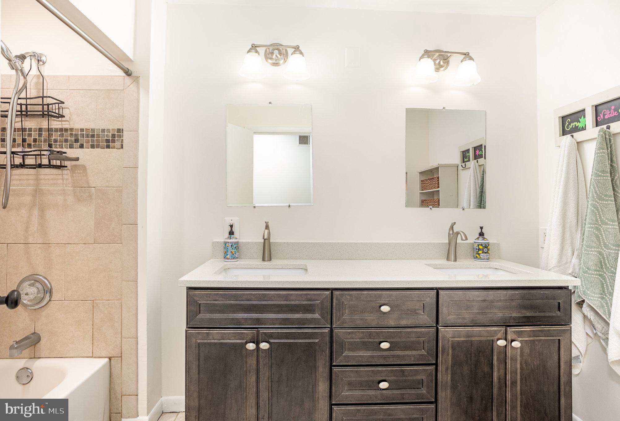 2007 Wilson Road White Hall, MD 21161 - Photo 16 of 41 a bathroom with a sink double vanity and a mirror