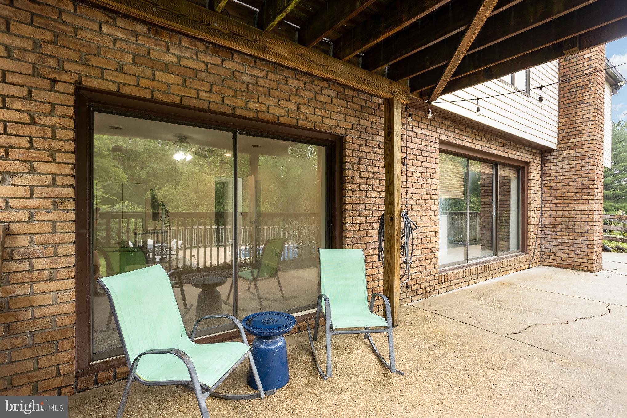 2007 Wilson Road White Hall, MD 21161 - Photo 31 of 41 a balcony with chairs and glass door