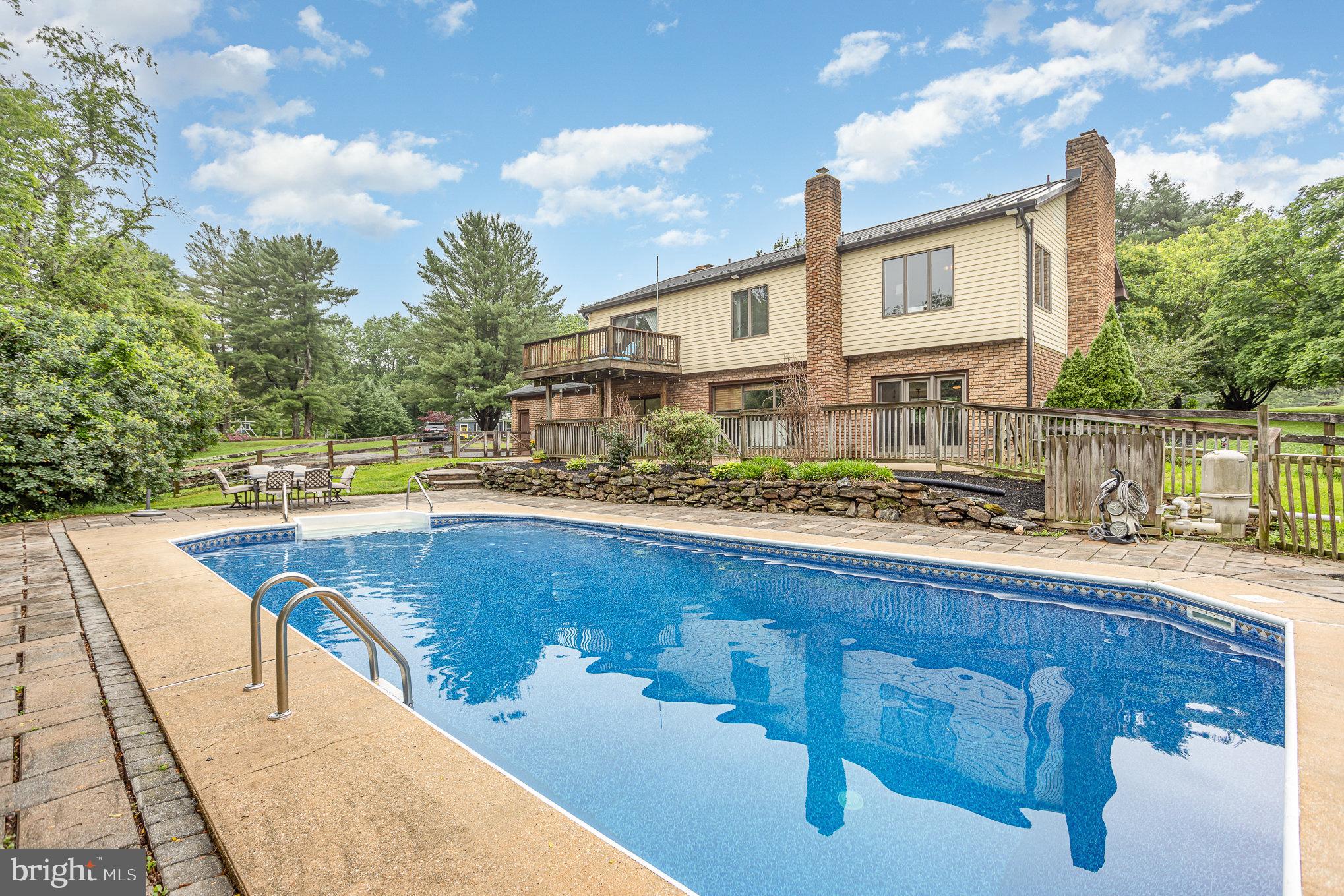 2007 Wilson Road White Hall, MD 21161 - Photo 35 of 41 a view of a swimming pool with a patio