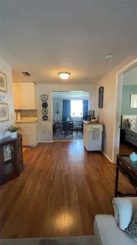 a kitchen with a sink and refrigerator