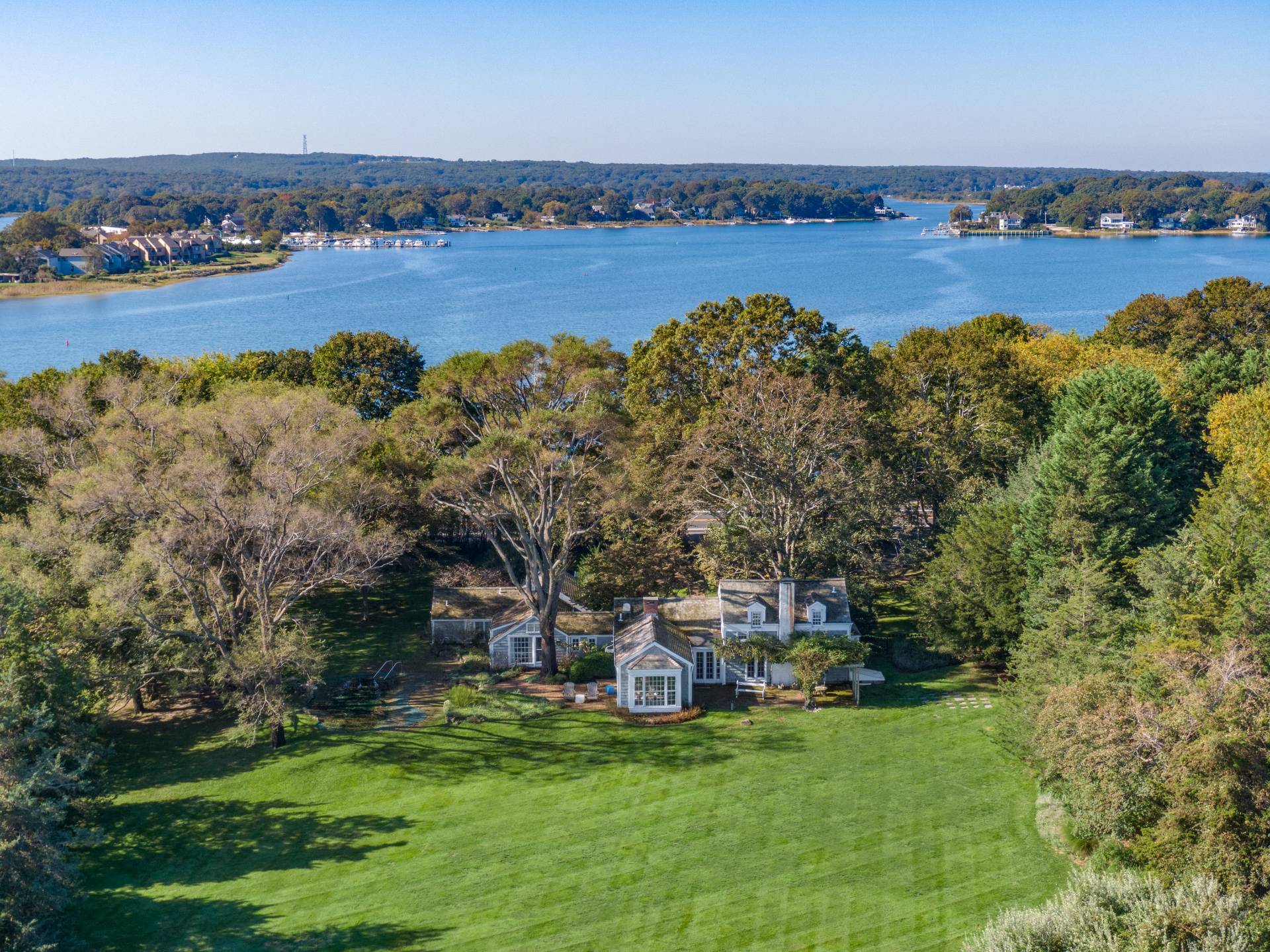 10 Ferry Road Sag Harbor, NY 11963 - Photo 2 of 41 an aerial view of a houses with a yard
