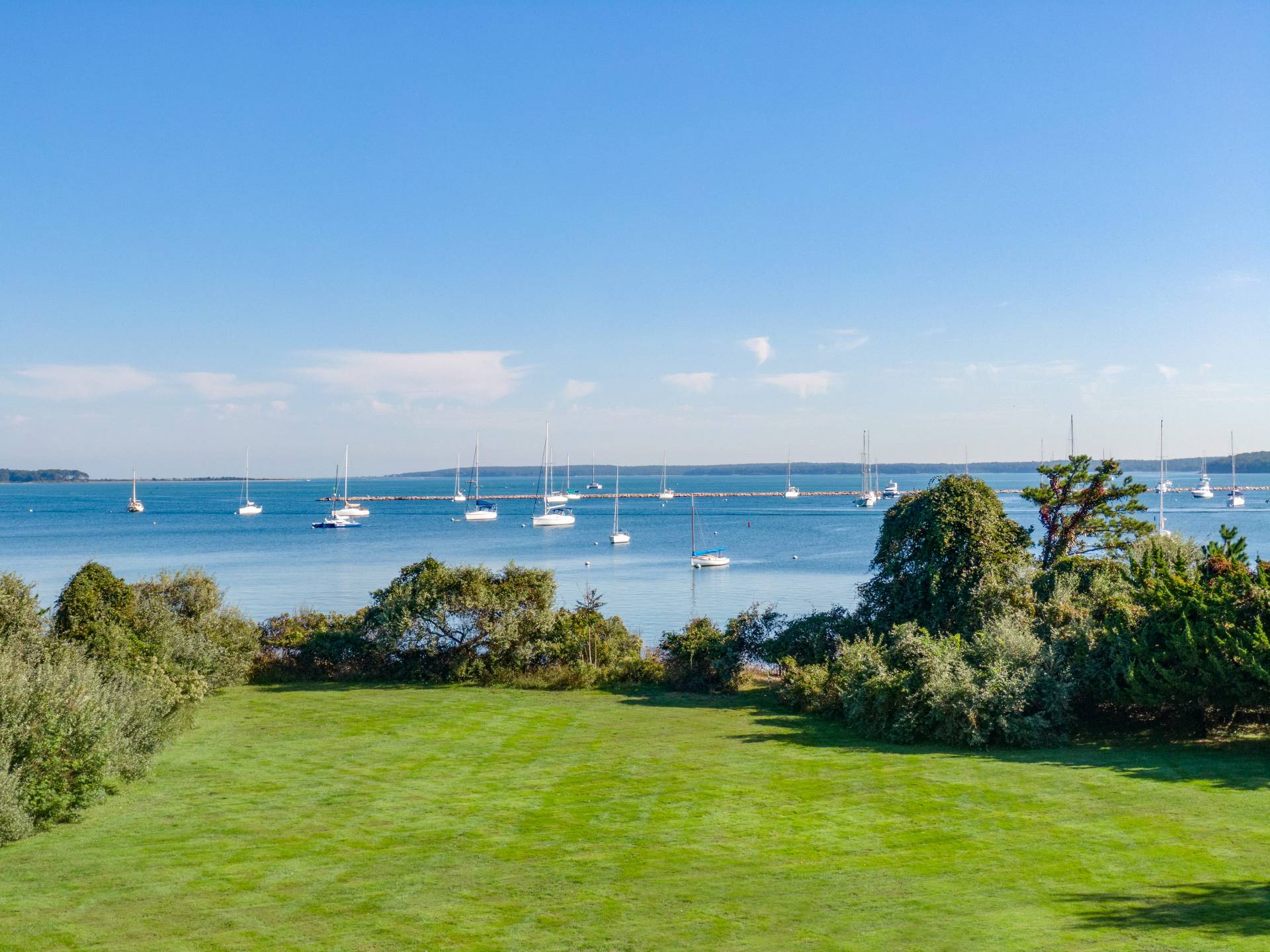 10 Ferry Road Sag Harbor, NY 11963 - Photo 5 of 41 a view of a lake with a big yard