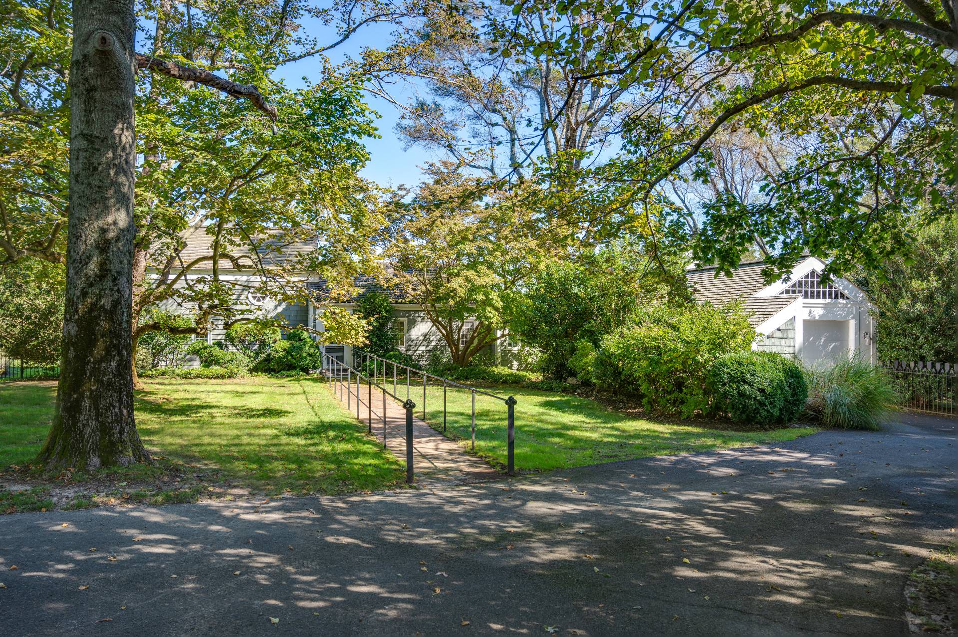 10 Ferry Road Sag Harbor, NY 11963 - Photo 8 of 41 a view of a yard with a tree
