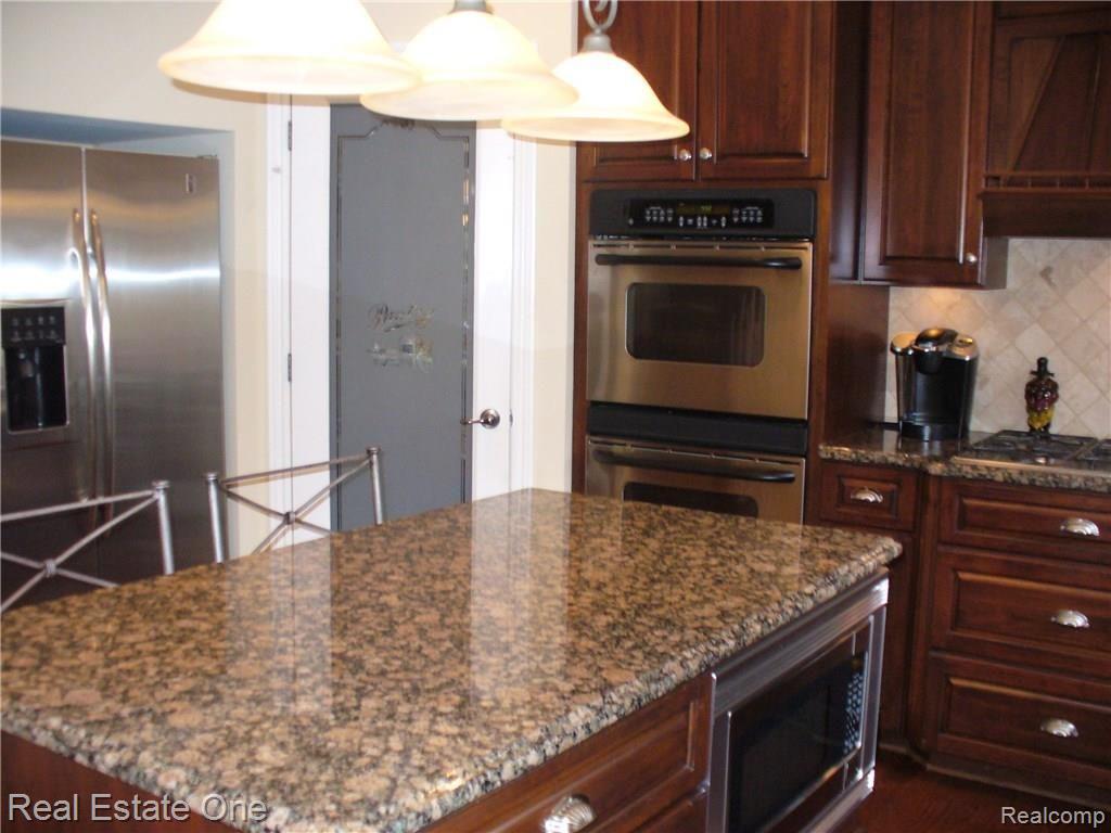 1336 Tranquility Court Rochester, MI 48306 - Photo 31 of 50 Island Center in the Gourmet Kitchen