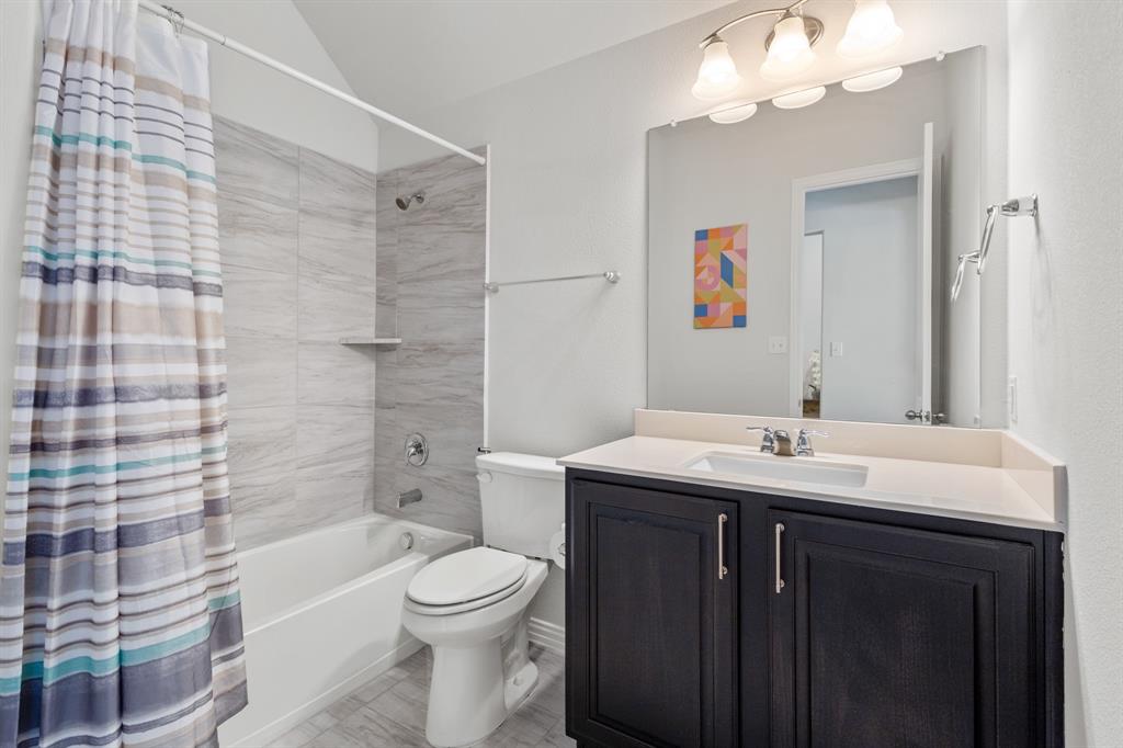 448 LeTara Ranch Drive Haslet, TX 76052 - Photo 18 of 32 a bathroom with a sink a toilet and shower