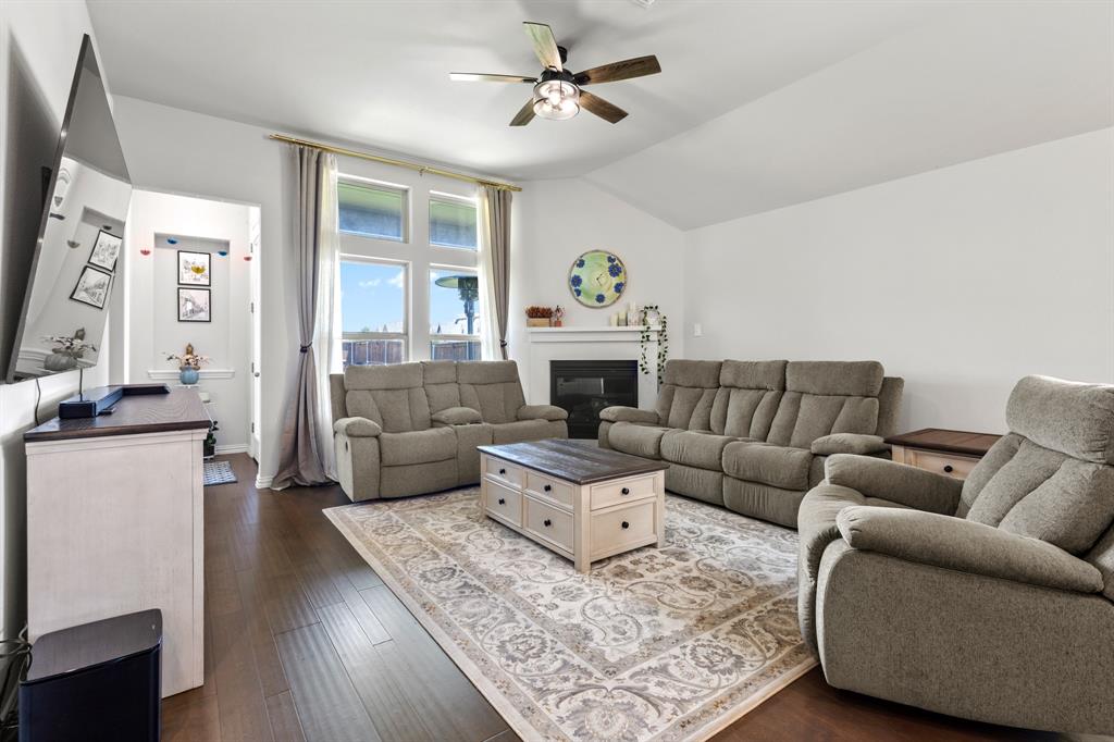 448 LeTara Ranch Drive Haslet, TX 76052 - Photo 10 of 32 a living room with furniture and a fireplace