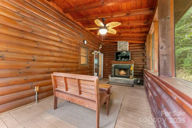 a view of front door with outdoor seating