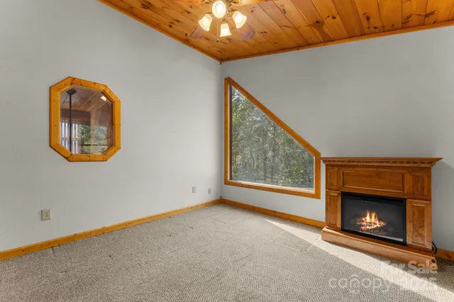 a view of a room that has a large window