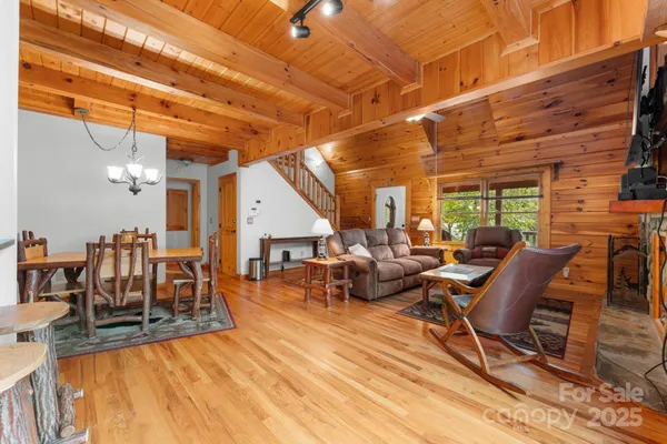 a front view of a house with a yard and a garage