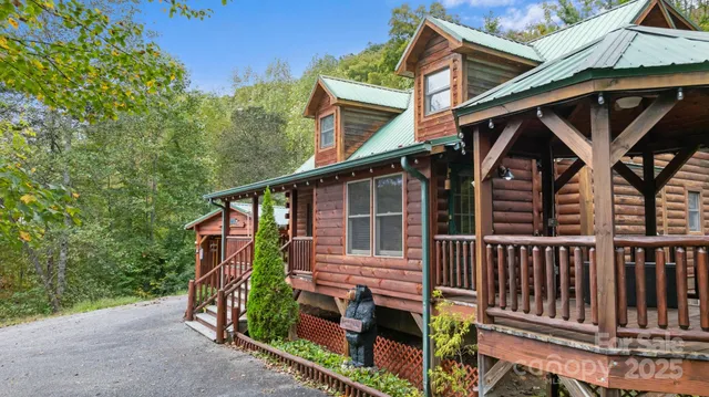 a view of a balcony with wooden fence and floor