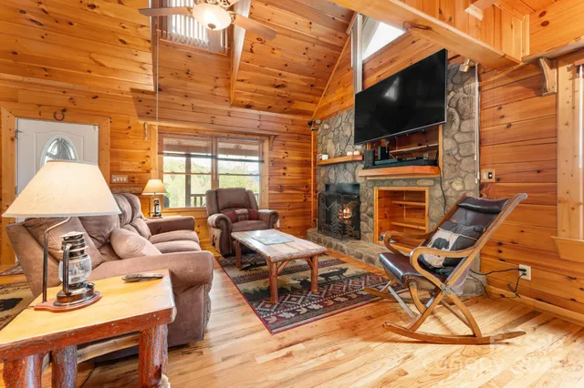 a outdoor space with patio the couches and flat screen tv