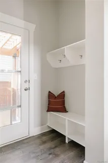 a wooden bench sitting in a room