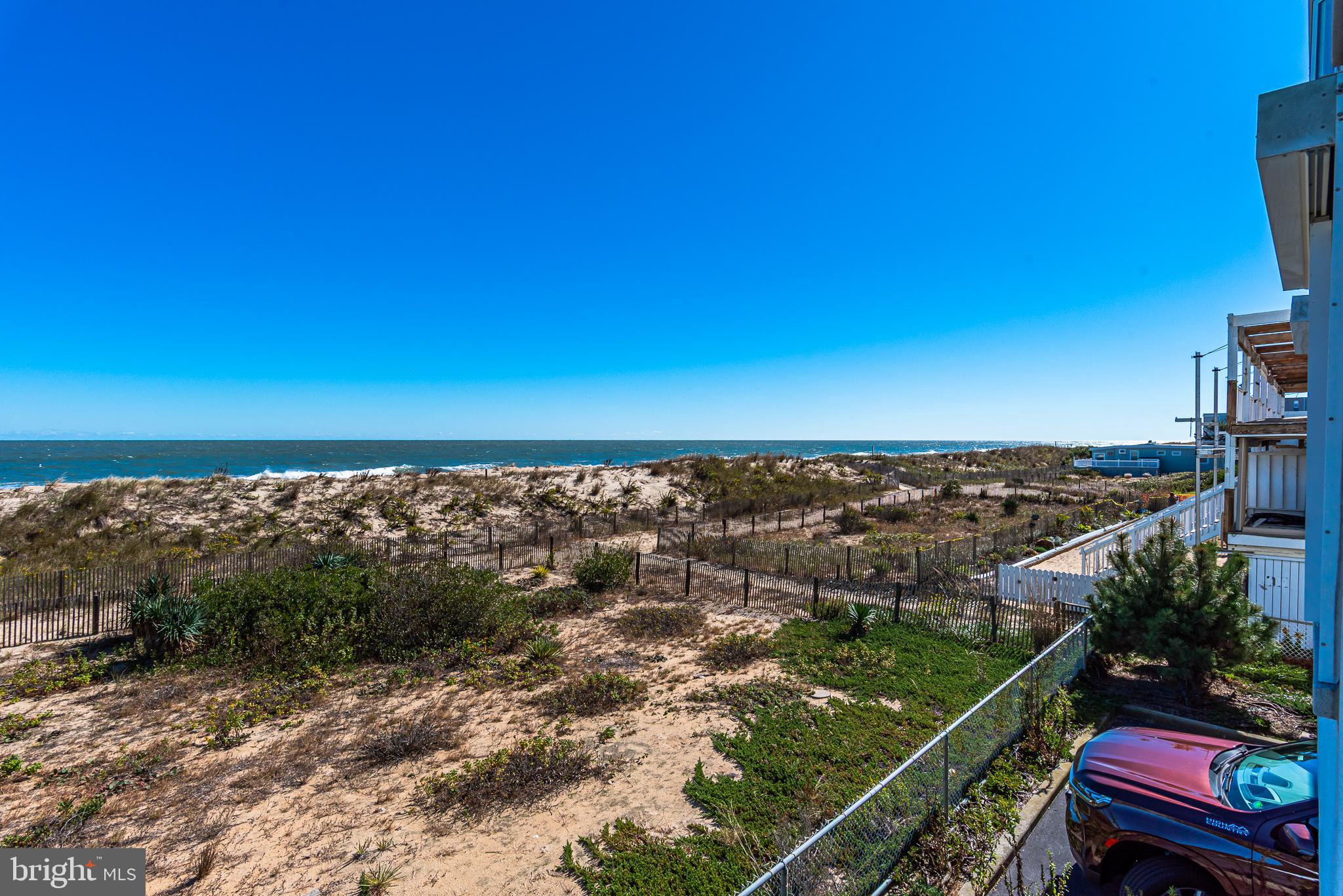 5 77th Street, Unit 102 Ocean City, MD 21842 - Photo 31 of 38 a view of a balcony with an outdoor space