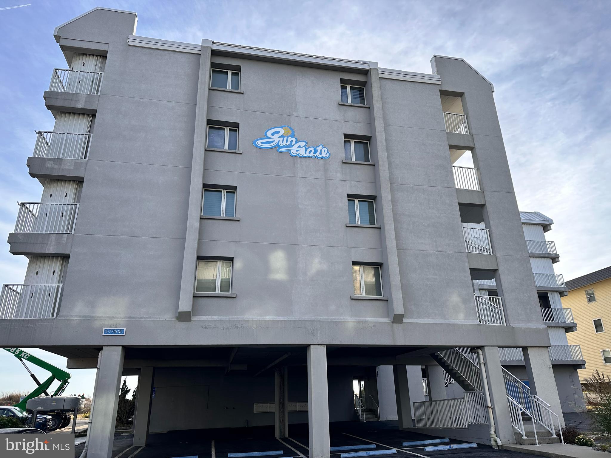 5 77th Street, Unit 102 Ocean City, MD 21842 - Photo 35 of 38 a view of a building with many windows