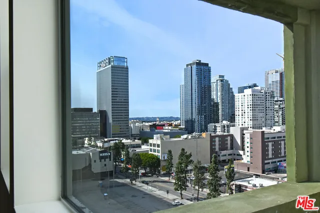 a building outdoor space with patio lots of furniture