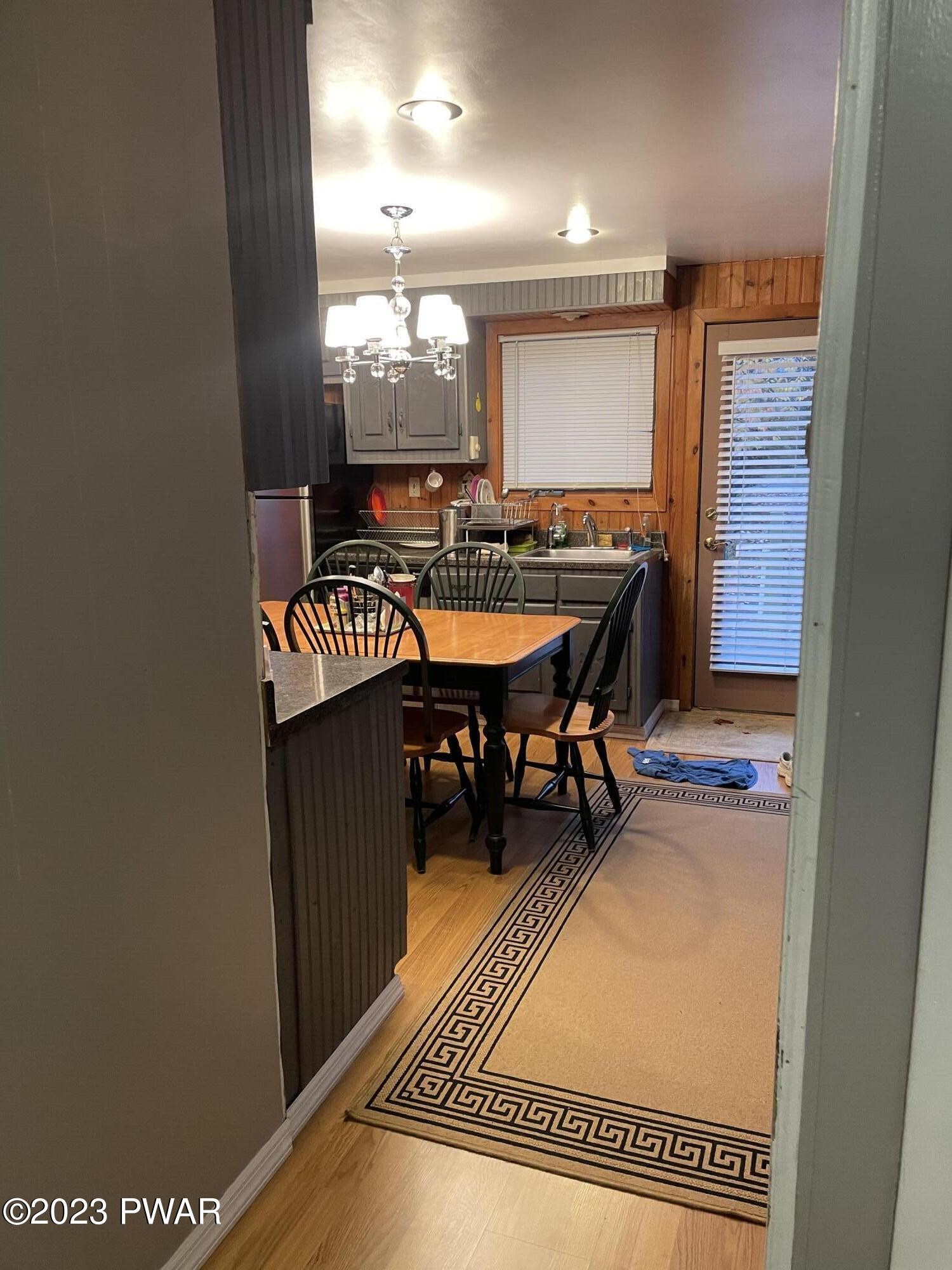 112 Stamford Road Dingmans Ferry, PA 18328 - Photo 10 of 26 a view of a a dining room with furniture