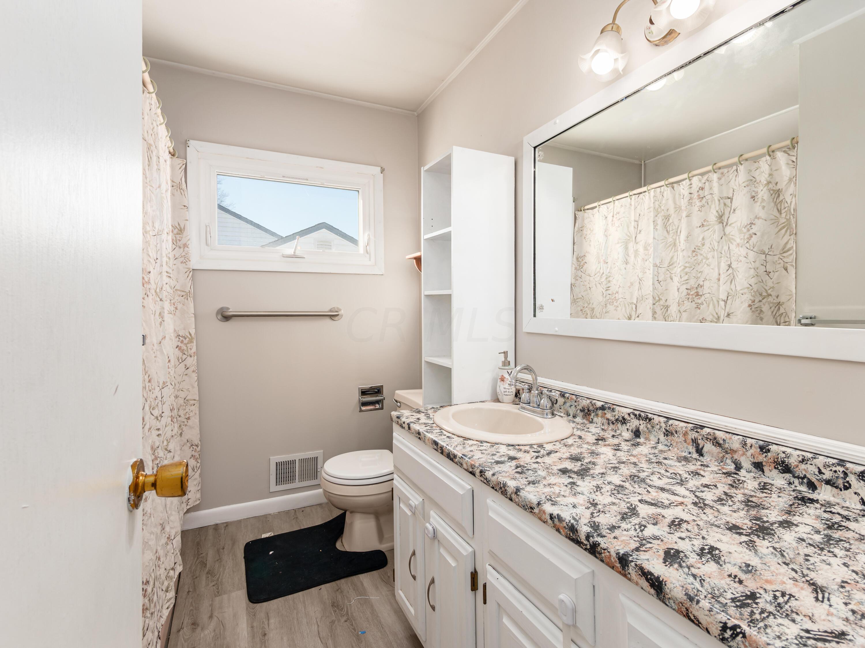 4943 Justin Road Columbus, OH 43227 - Photo 19 of 33 Upstairs Bathroom