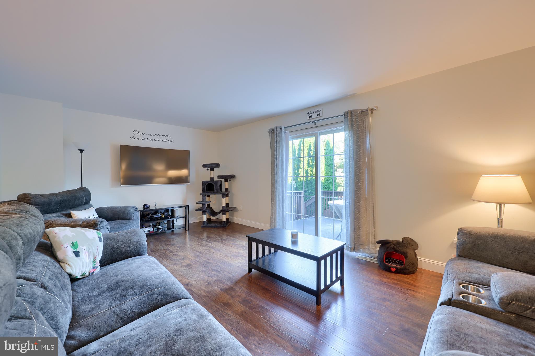 216 Nicole Way Sinking Spring, PA 19608 - Photo 21 of 35 a living room with furniture and a wooden floor