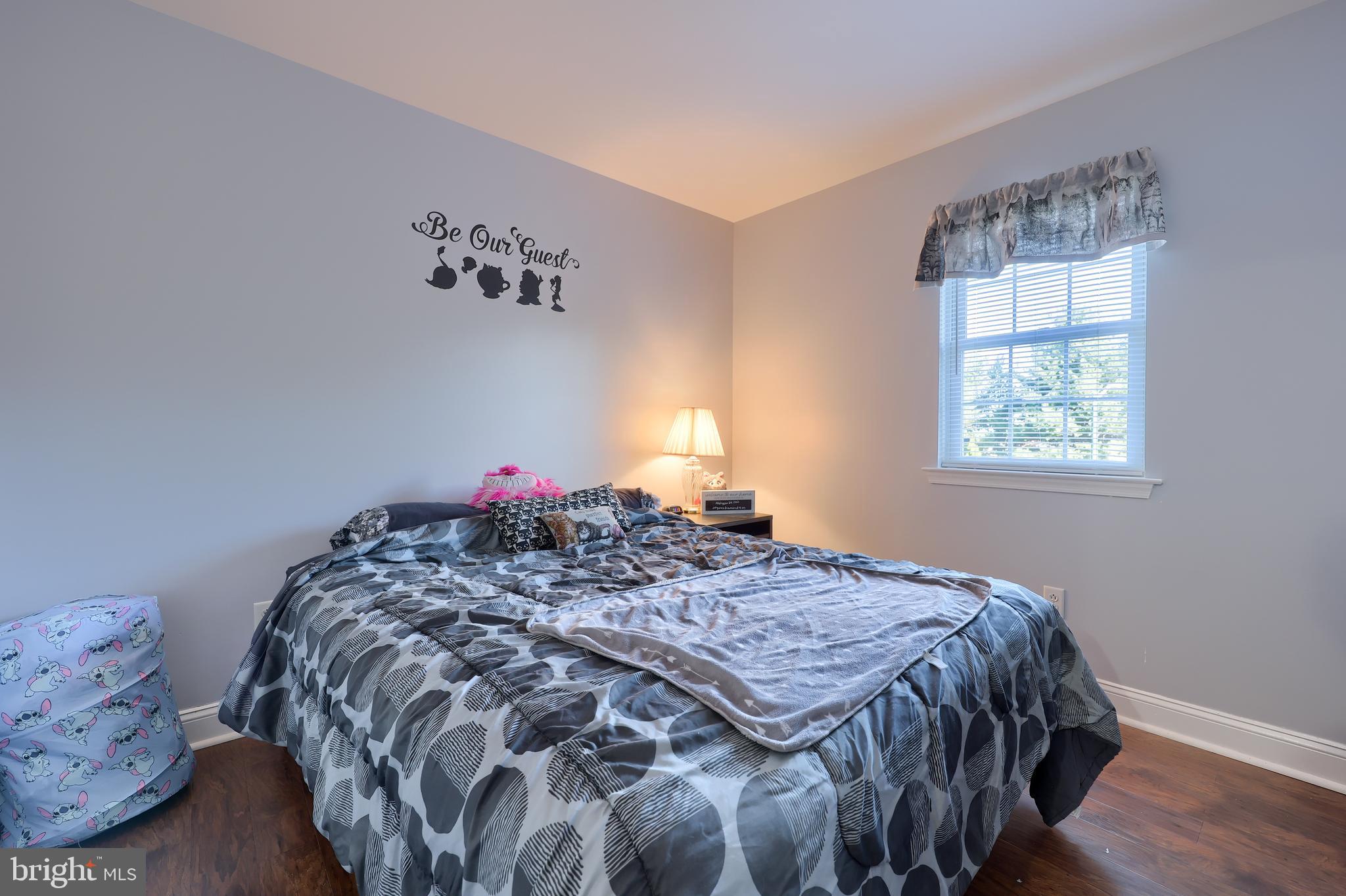 216 Nicole Way Sinking Spring, PA 19608 - Photo 29 of 35 a bedroom with a bed and window