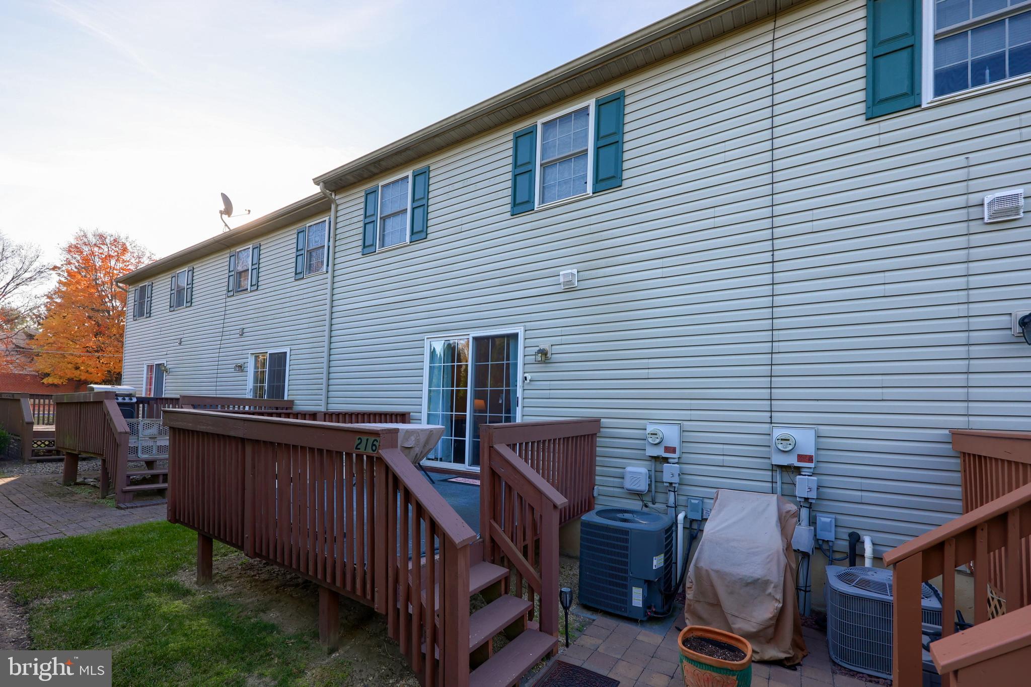216 Nicole Way Sinking Spring, PA 19608 - Photo 3 of 35 a view of a house with backyard and furniture