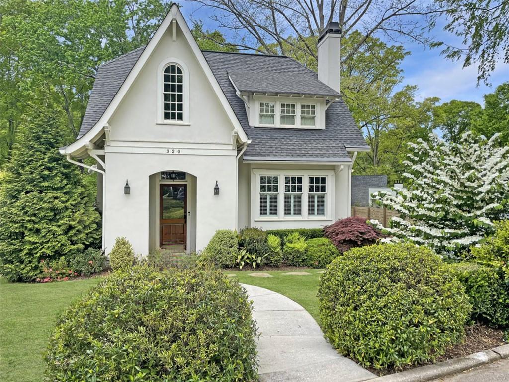 320 Ridgeland Avenue Decatur, GA 30030 - Photo 1 of 1 front view of a house with a yard