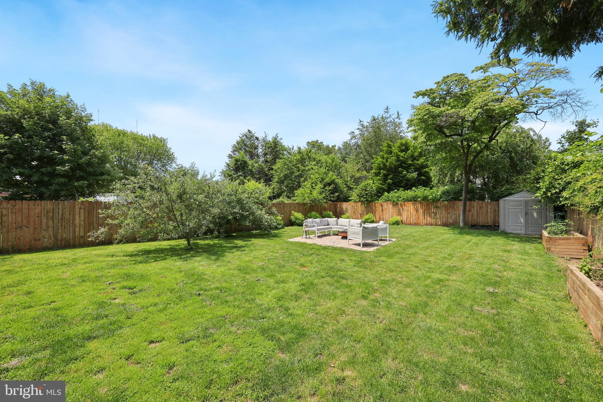 7808 Ridge Avenue Philadelphia, PA 19128 - Photo 17 of 18 a view of a backyard with sitting area