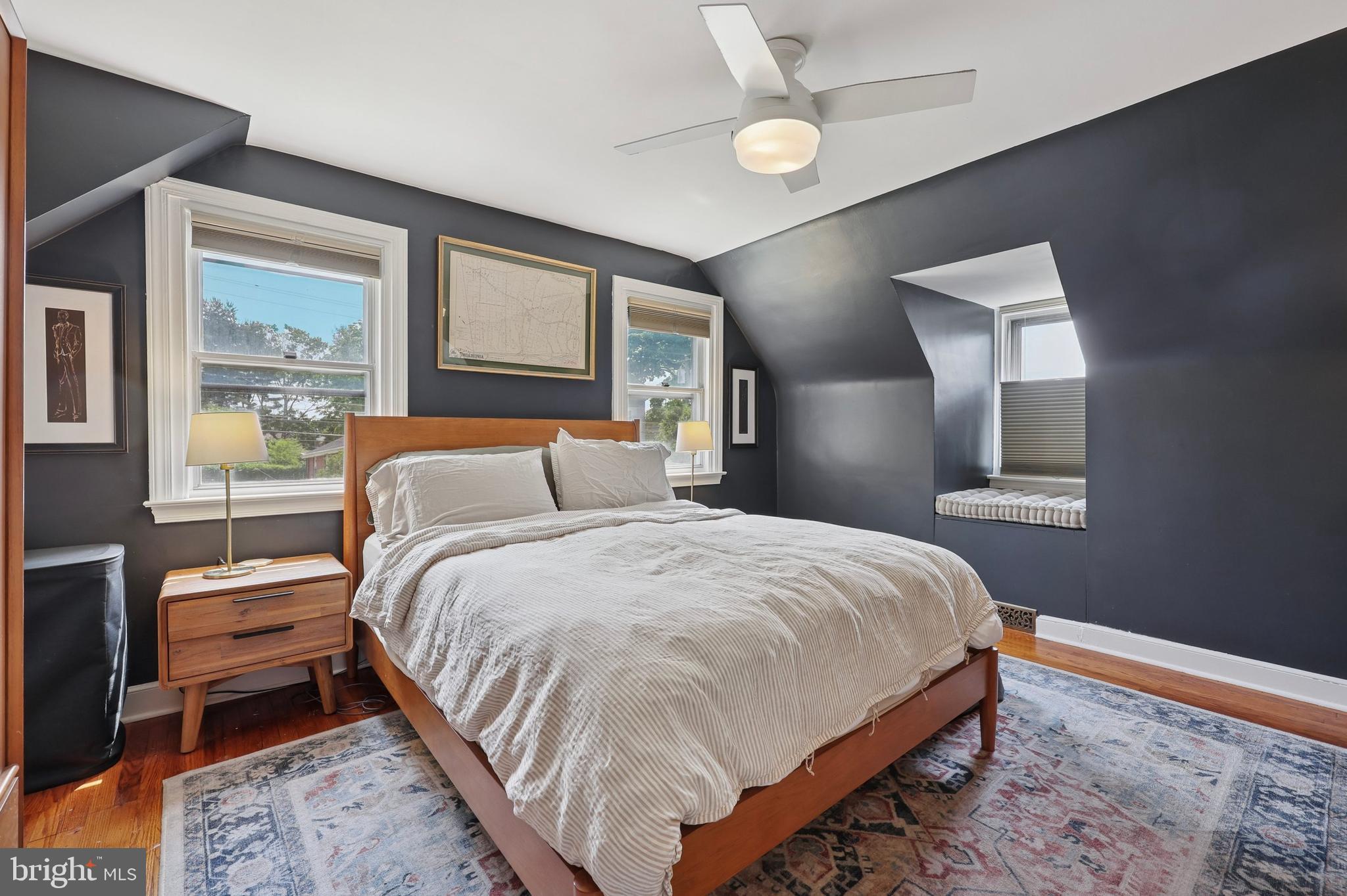 7808 Ridge Avenue Philadelphia, PA 19128 - Photo 9 of 18 a bed room with a bed and a chair