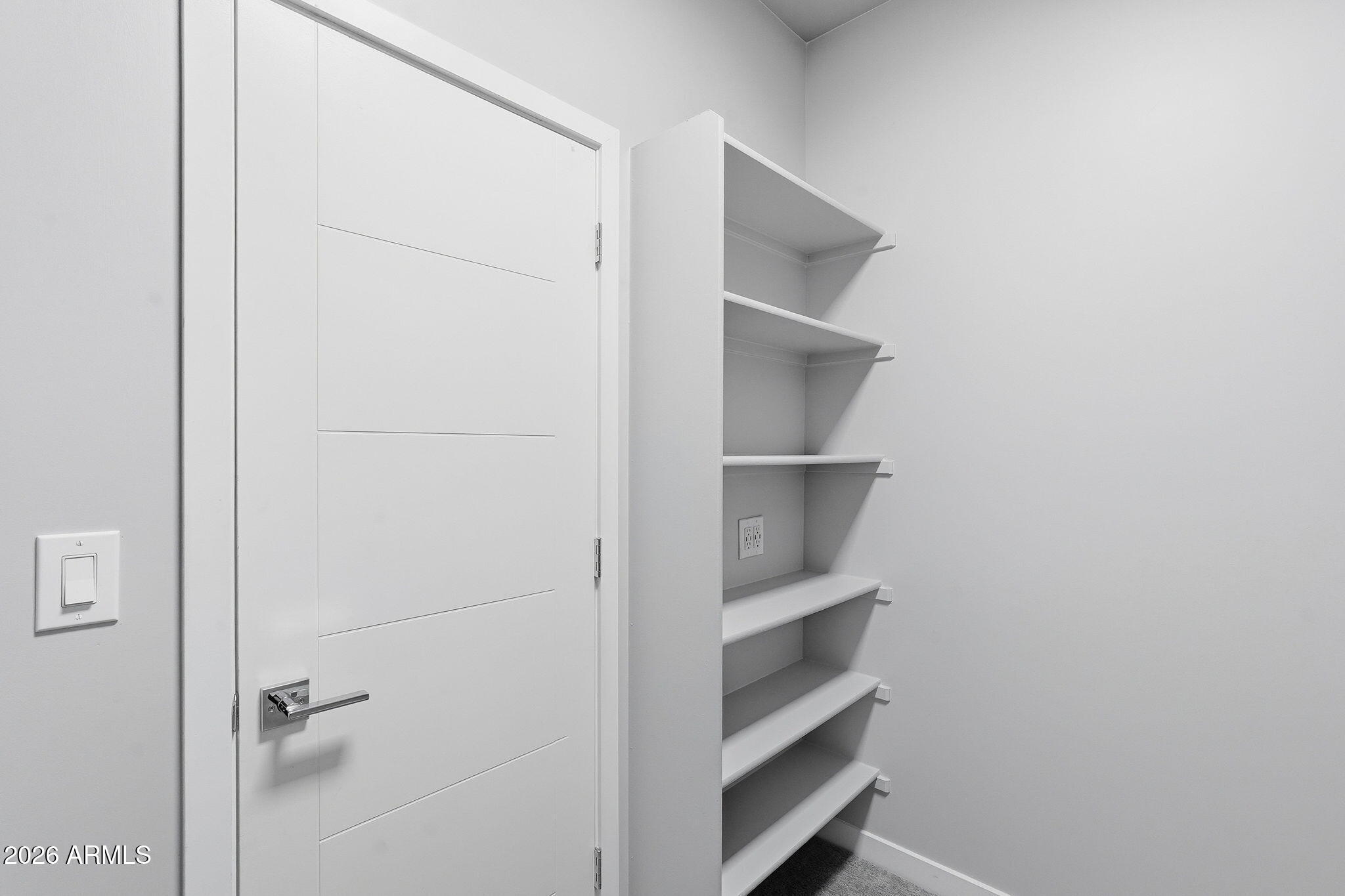 2727 East Thomas Road, Unit 5 Phoenix, AZ 85016 - Photo 28 of 41 a view of walk in closet with empty racks