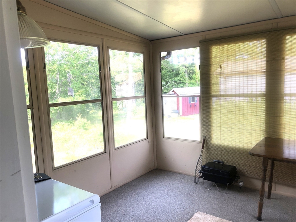 41 Pipers Way Carver, MA 02330 - Photo 28 of 36 a living room with furniture and a window