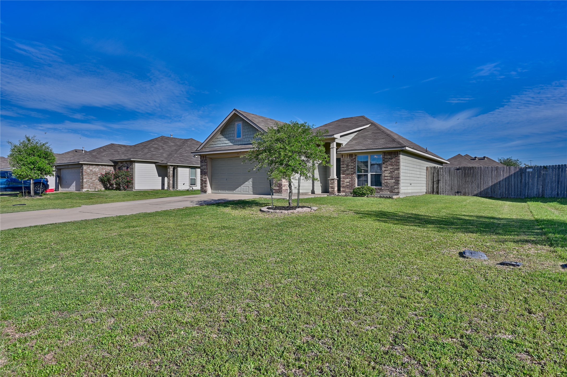 808 Mockingbird Street Navasota, TX 77868 - Photo 3 of 19 a front view of a house with a yard