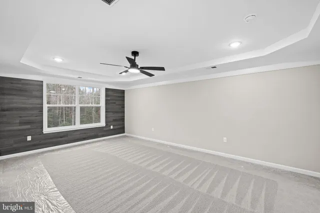 a bathroom with a double vanity sink mirror and shower