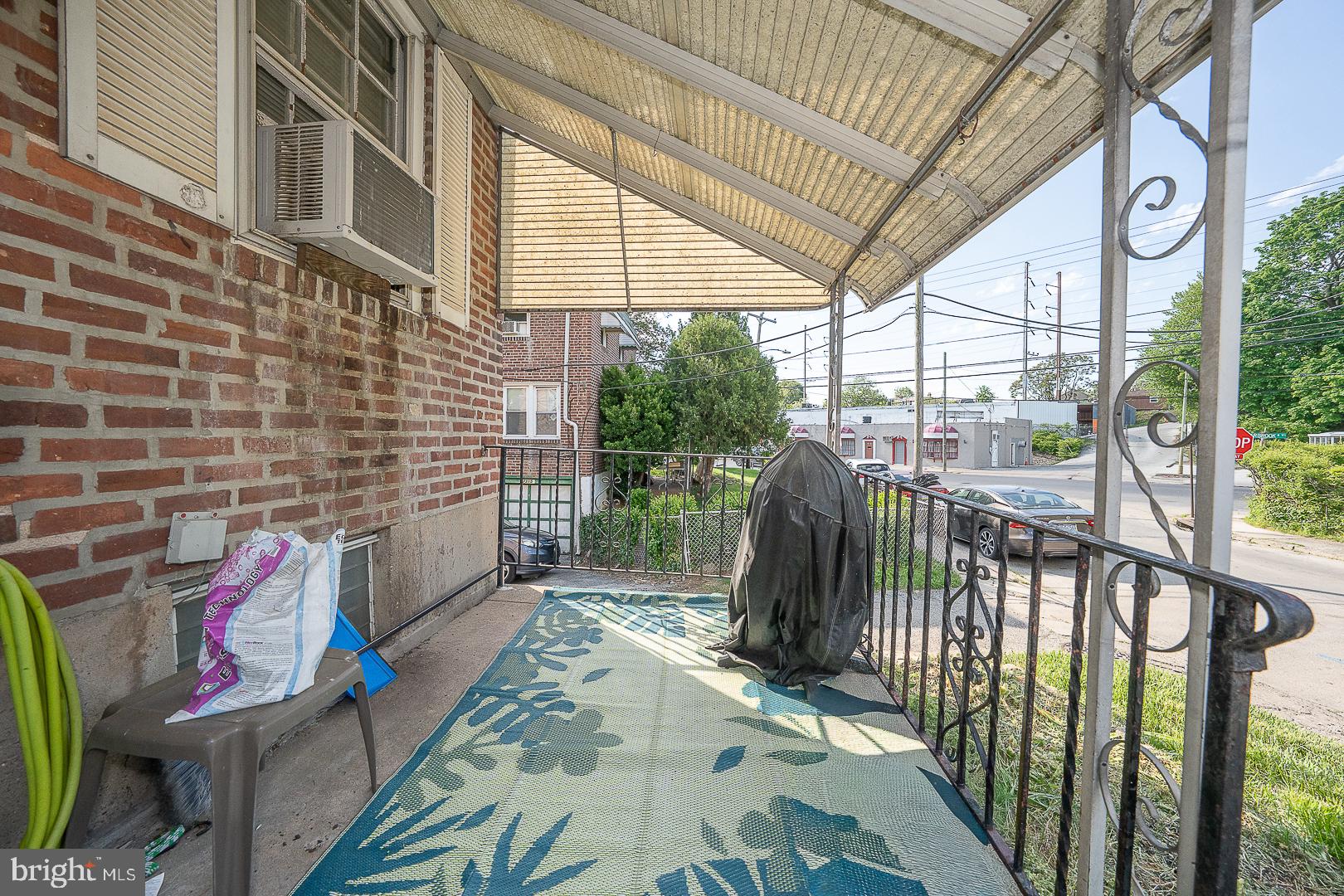 103 Margate Road Upper Darby, PA 19082 - Photo 18 of 20 Charming porch with inviting greenery.