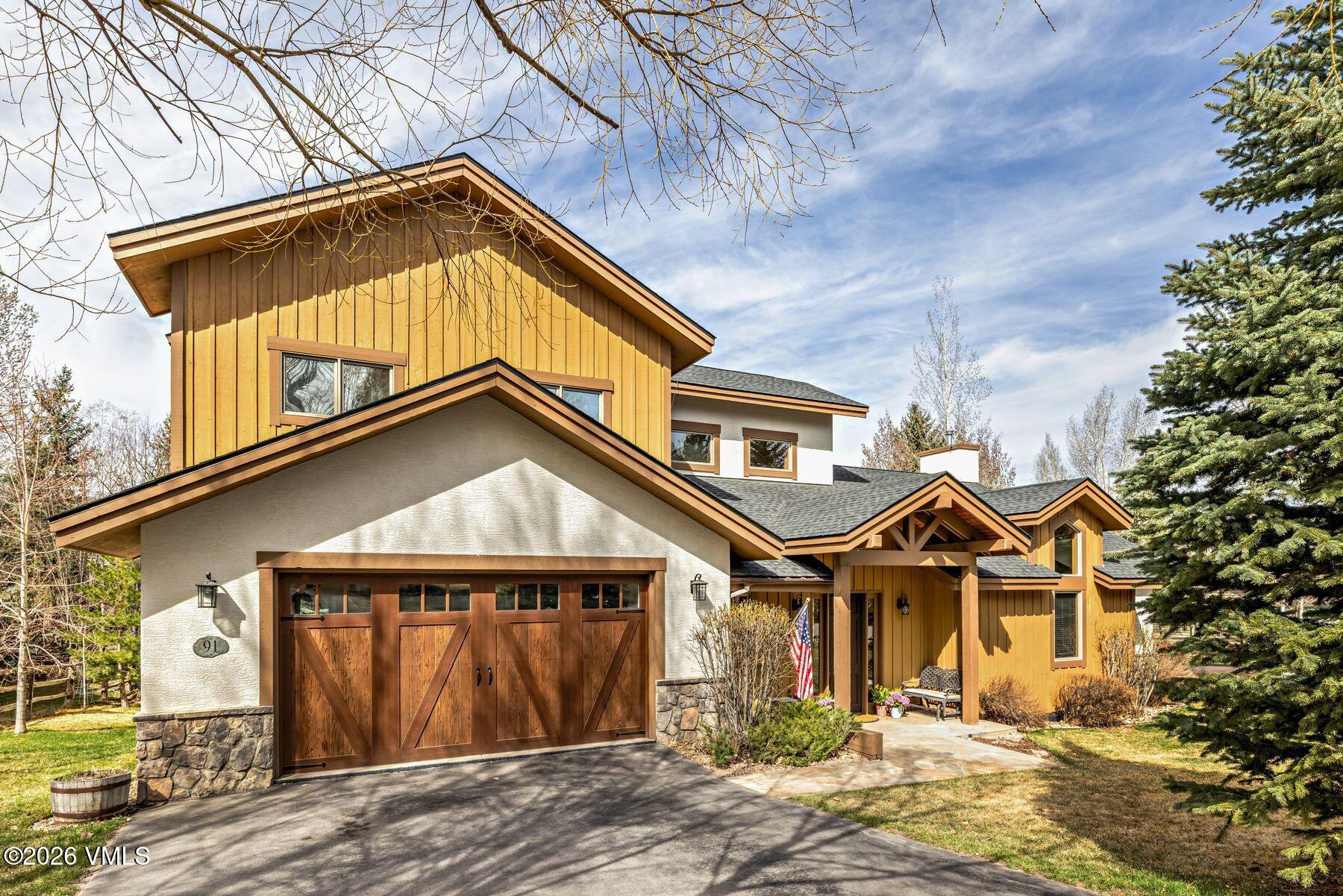 91 Creamery Trail Edwards, CO 81632 - Photo 43 of 44 a front view of a house with a yard