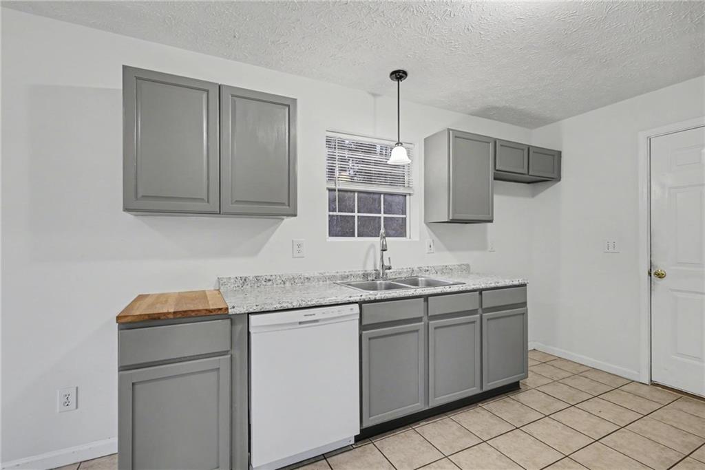 4836 Odessa W Inlet Northwest Acworth, GA 30101 - Photo 12 of 20 a kitchen with a sink and cabinets