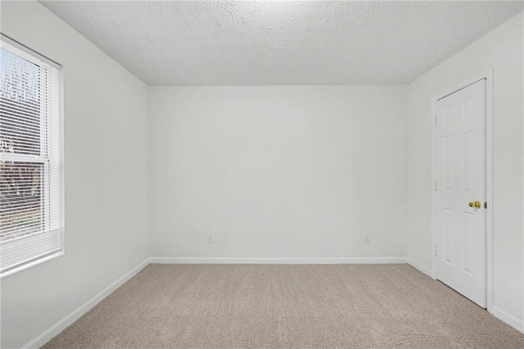 4836 Odessa W Inlet Northwest Acworth, GA 30101 - Photo 16 of 20 an empty room with a empty space and window