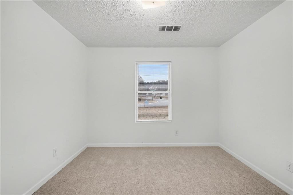 4836 Odessa W Inlet Northwest Acworth, GA 30101 - Photo 17 of 20 an empty room with a window