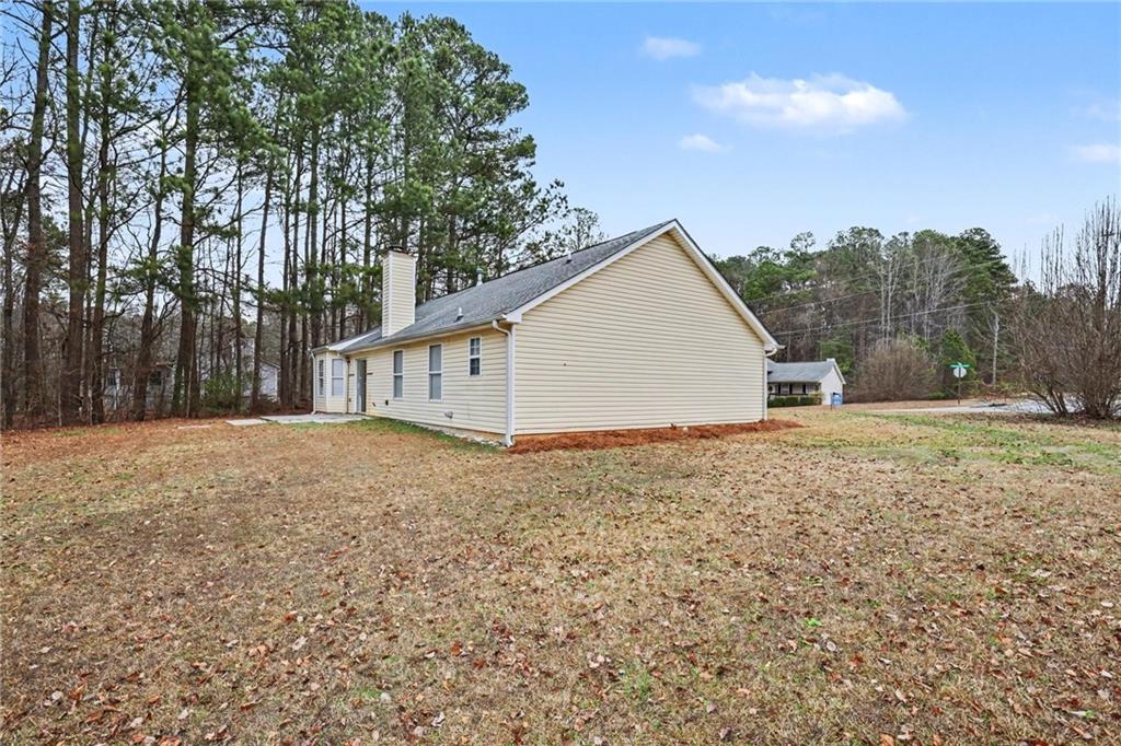 4836 Odessa W Inlet Northwest Acworth, GA 30101 - Photo 20 of 20 a view of a house with a backyard