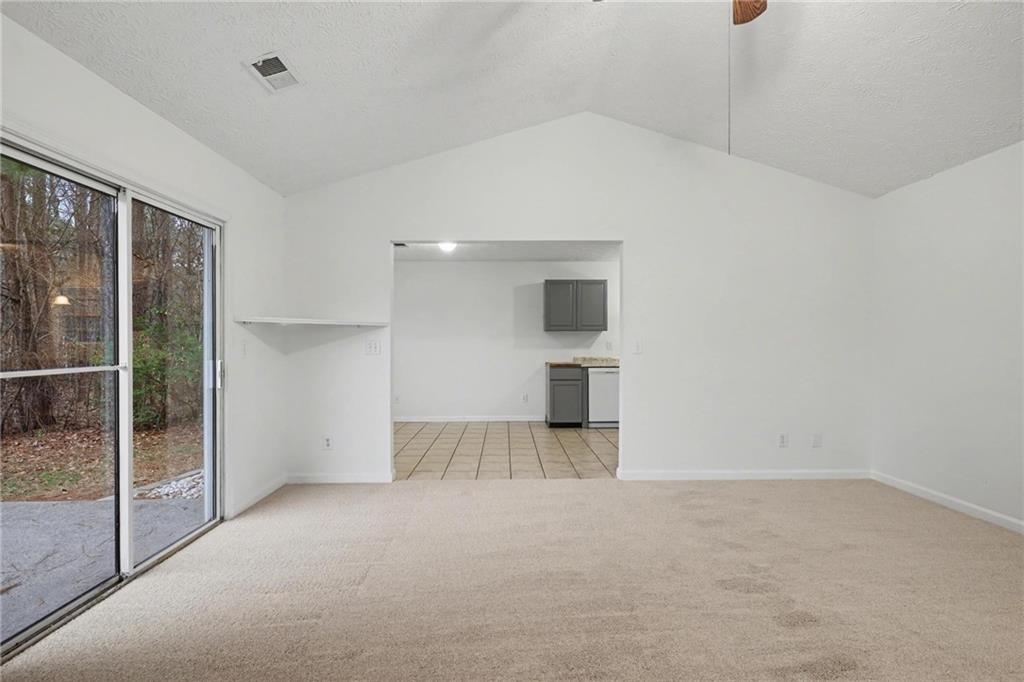 4836 Odessa W Inlet Northwest Acworth, GA 30101 - Photo 6 of 20 a view of empty room with wooden floor and fan