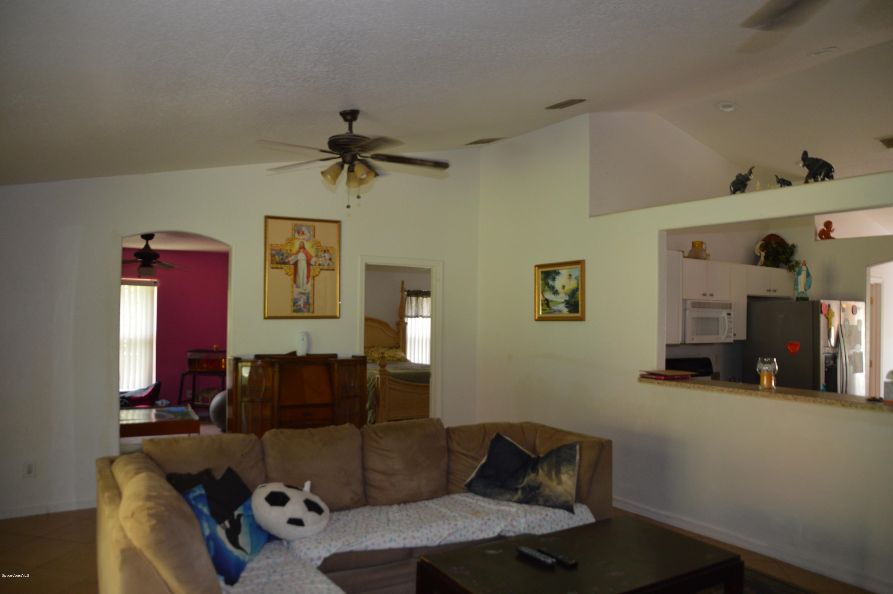 3141 Aspen Road Southeast Palm Bay, FL 32909 - Photo 12 of 24 Family room