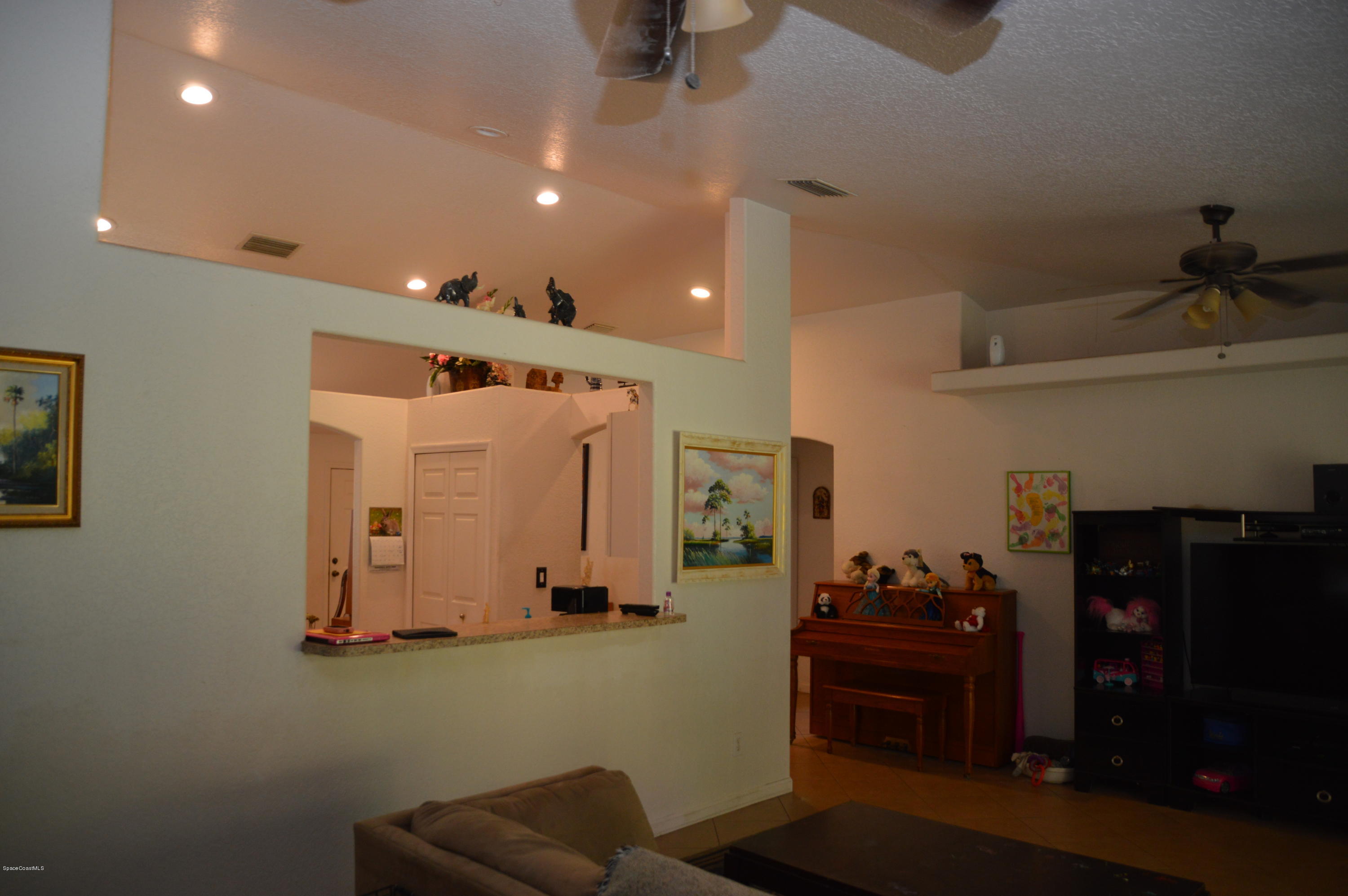 3141 Aspen Road Southeast Palm Bay, FL 32909 - Photo 13 of 24 13- Kitchen from family room