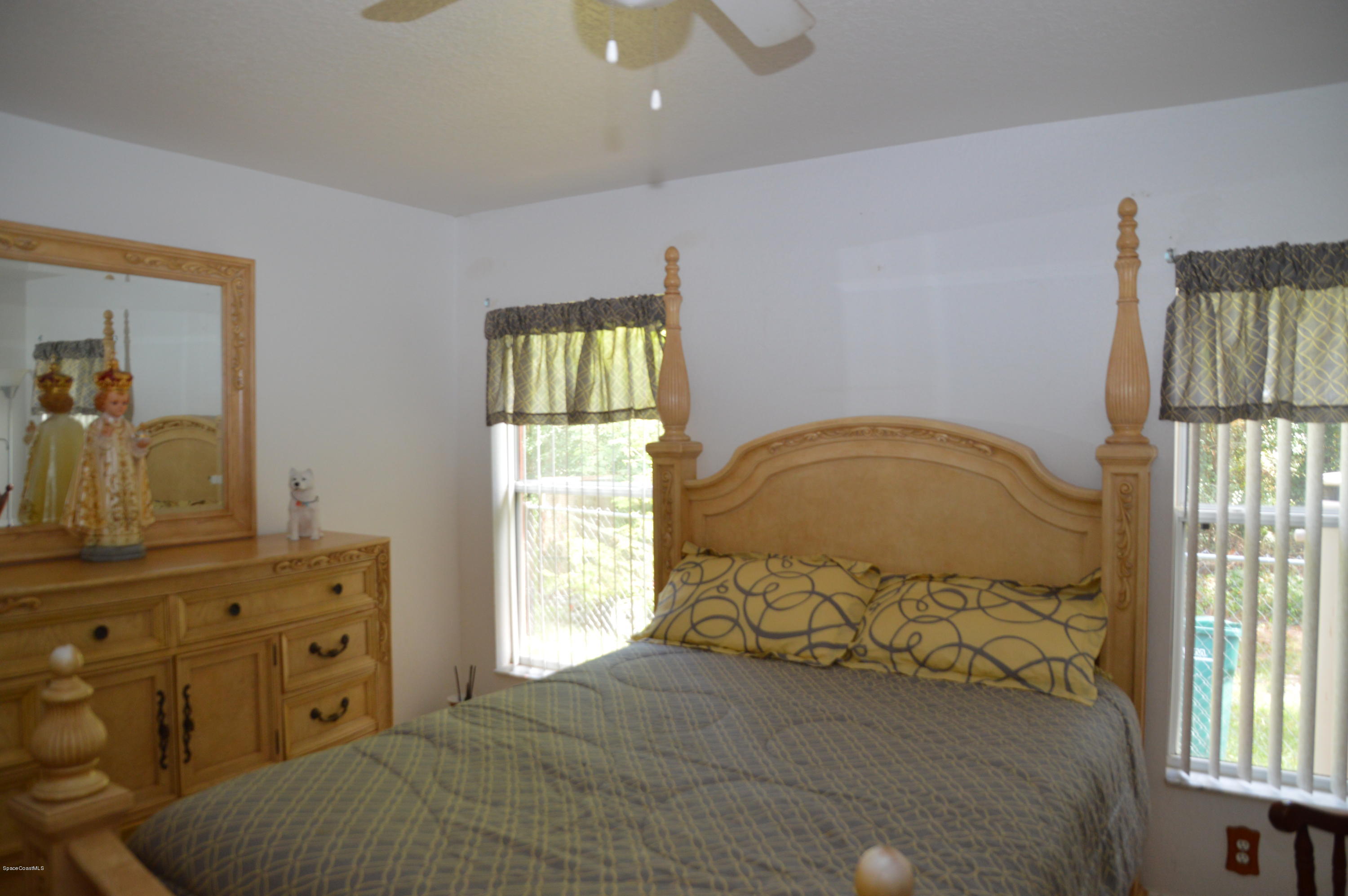 3141 Aspen Road Southeast Palm Bay, FL 32909 - Photo 16 of 24 Master Bedroom