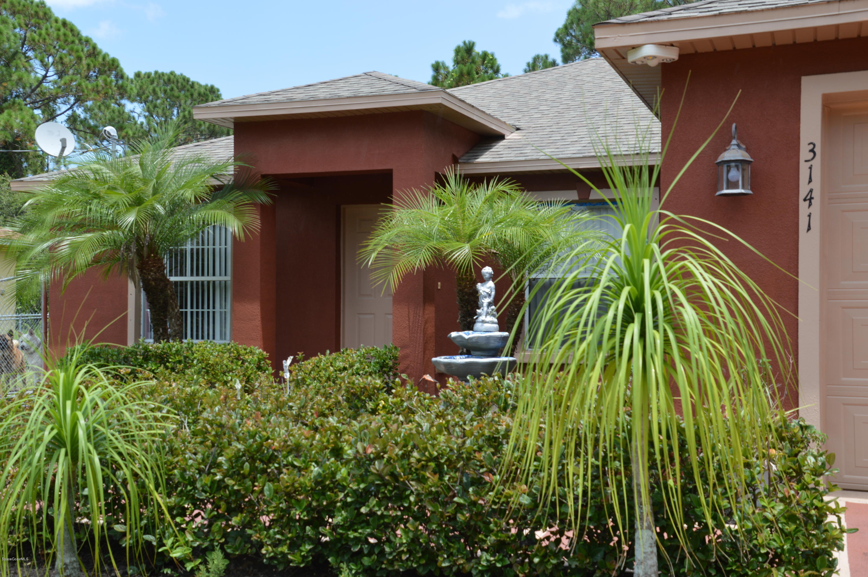 3141 Aspen Road Southeast Palm Bay, FL 32909 - Photo 3 of 24 3 - Front