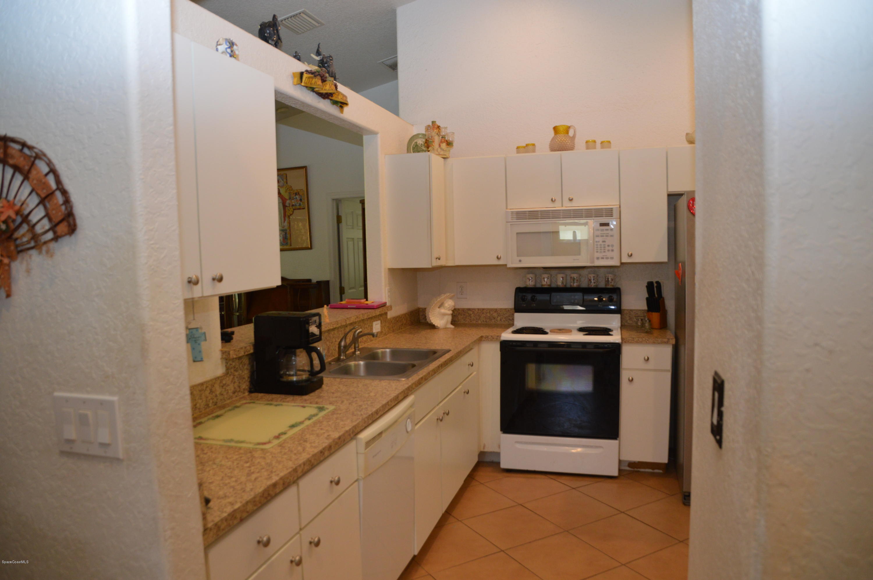 3141 Aspen Road Southeast Palm Bay, FL 32909 - Photo 8 of 24 8 - kitchen