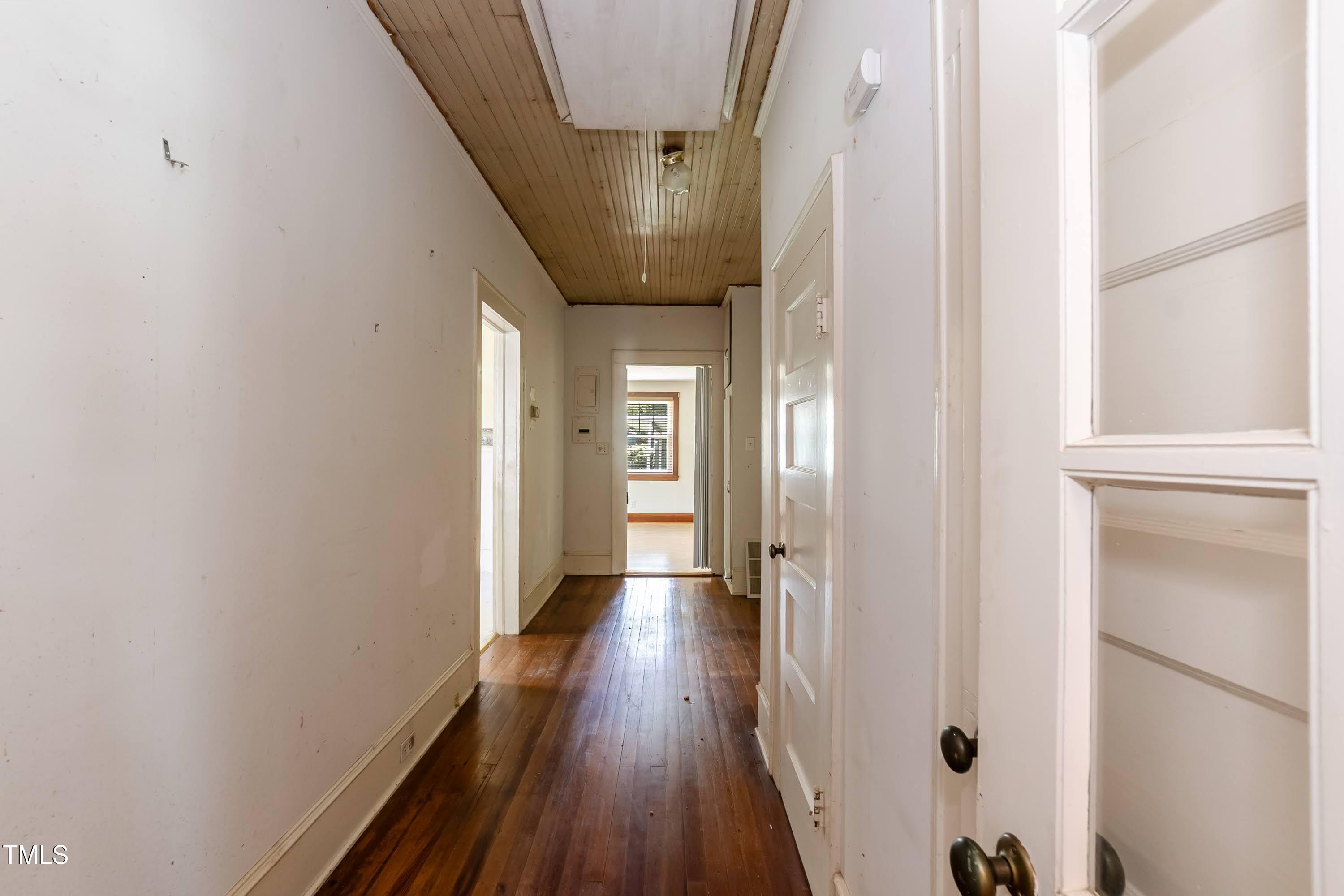 310 Spring Street Durham, NC 27703 - Photo 24 of 43 a view of hallway with wooden floor