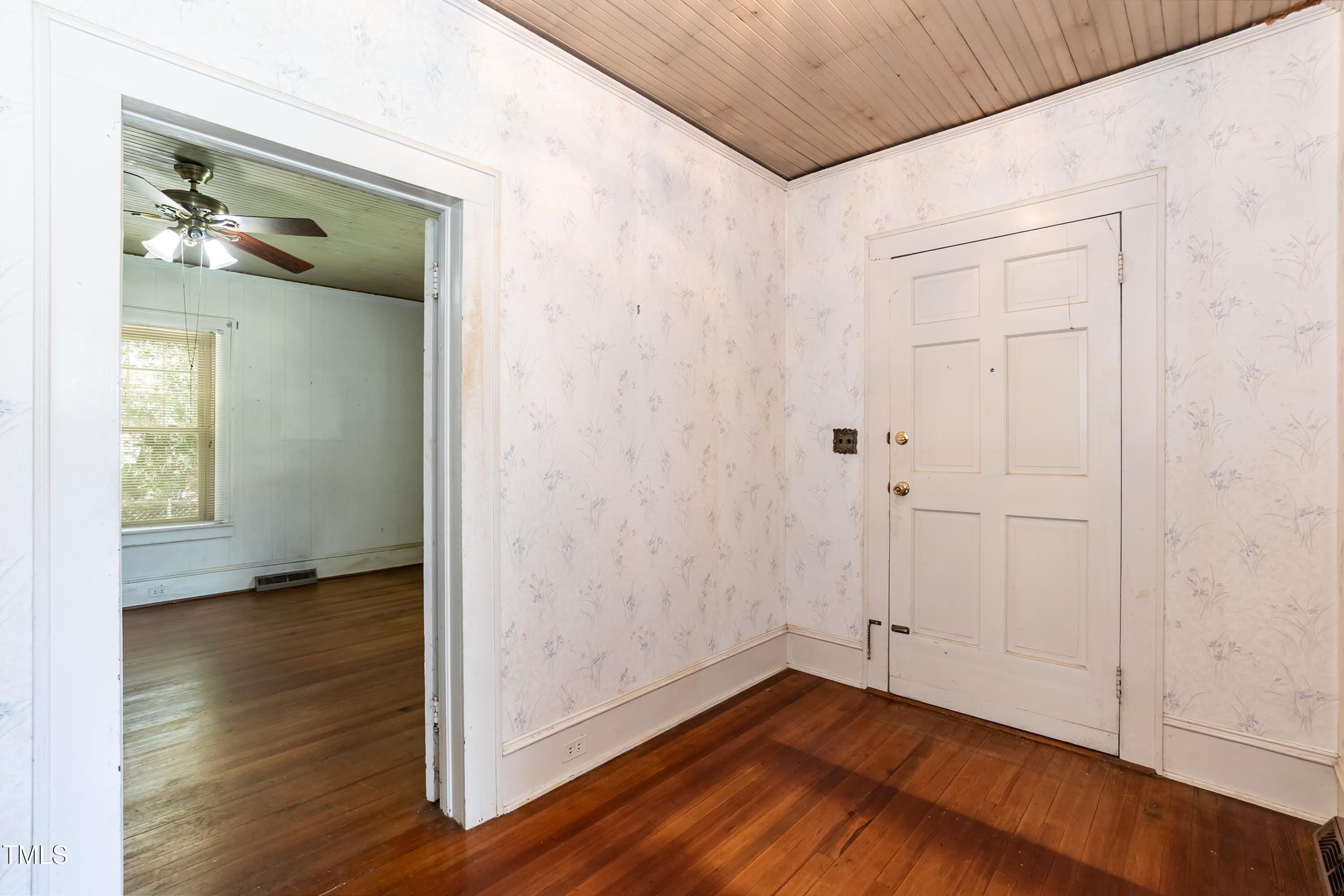 310 Spring Street Durham, NC 27703 - Photo 28 of 43 a view of a hallway with wooden floor