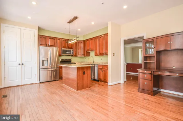 a view of a livingroom with wooden floor