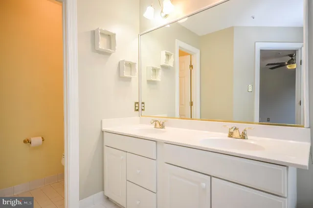 a white refrigerator freezer and a stove sitting inside of a refrigerator
