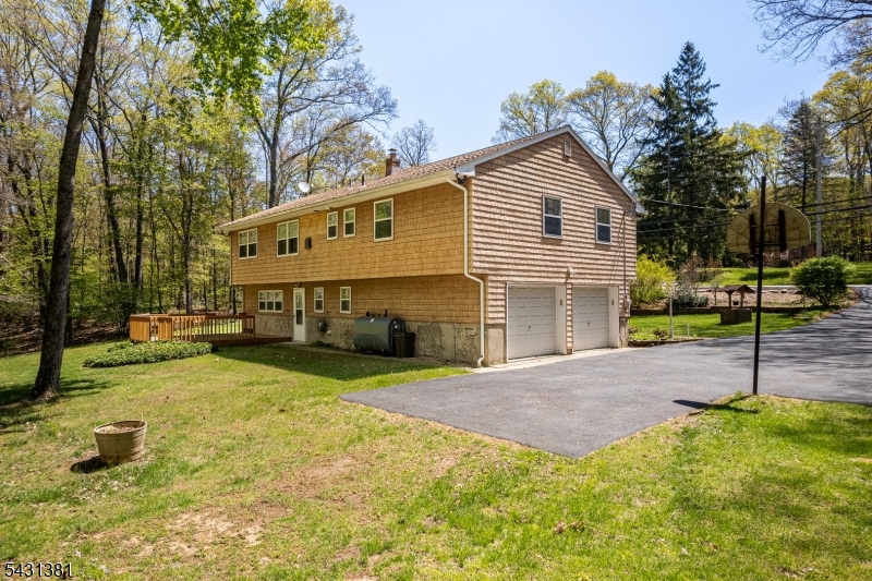 1089 Green Pond Road Newfoundland, NJ 07435 - Photo 29 of 34 a house view with a garden space