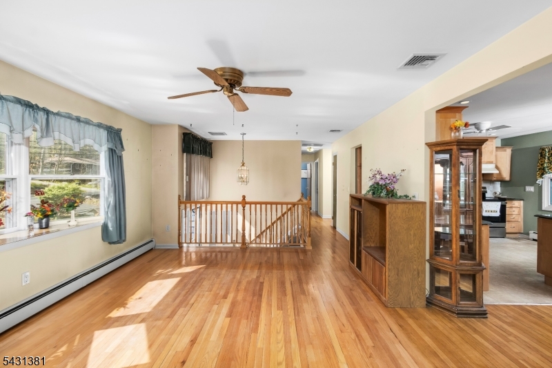 1089 Green Pond Road Newfoundland, NJ 07435 - Photo 4 of 34 a view of a room with wooden floor and windows