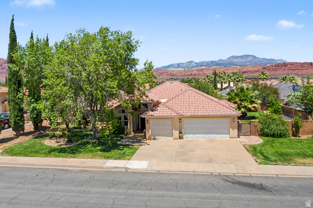 3034 Swiss Drive Santa Clara, UT 84765 - Photo 47 of 59 Single-story residence featuring a tile roof and an attached two-car garage